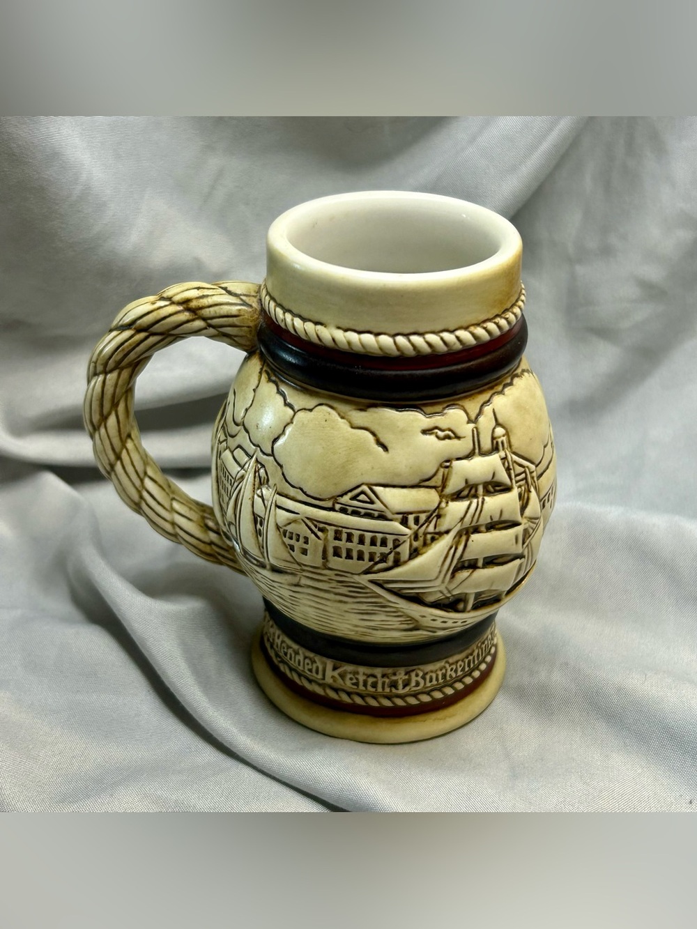 Avon Cream Ceramic Nautical Relief Stein with Brown and Maroon Accents